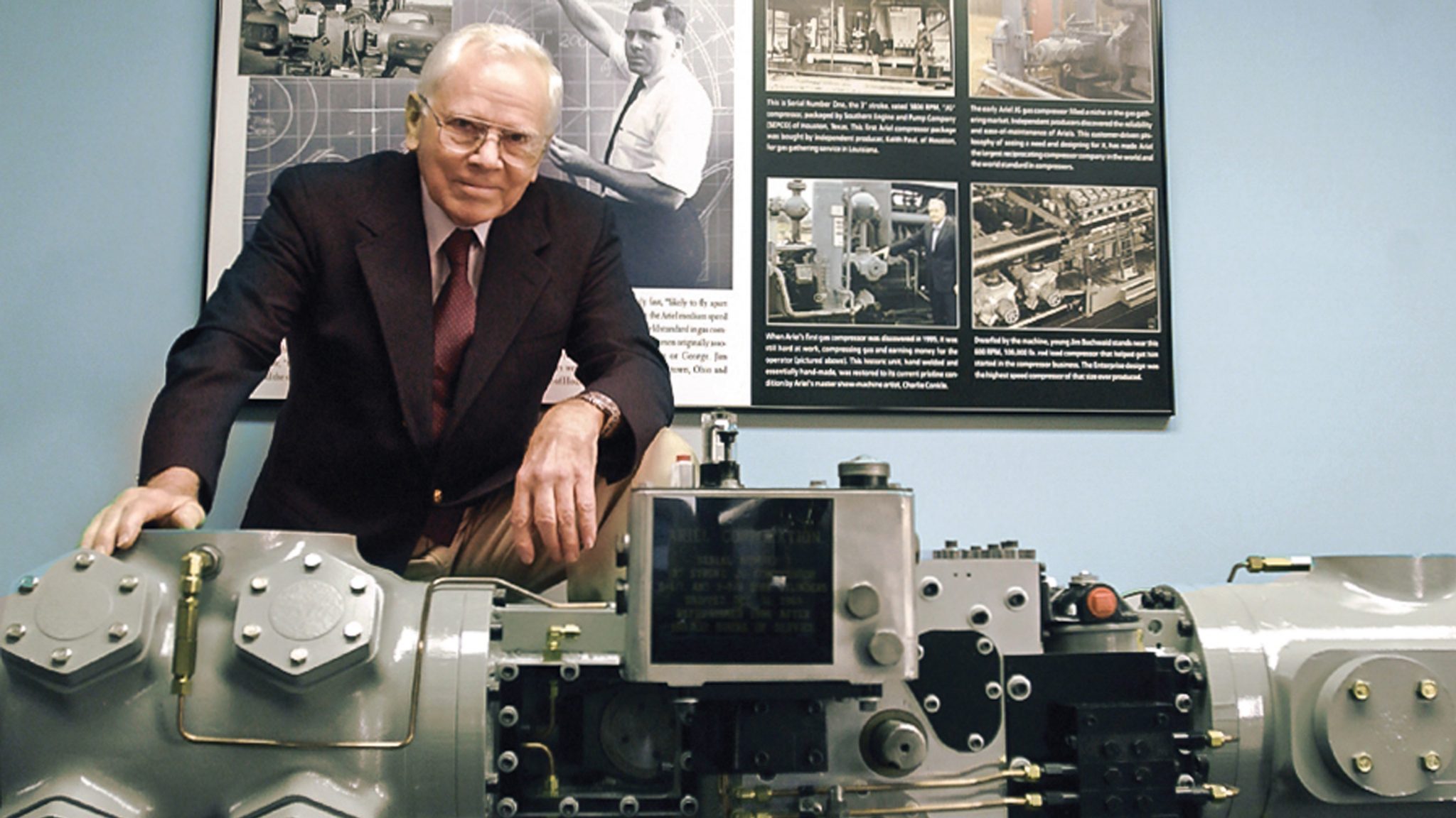 Founder of Ariel, Jim Buchwald stands behind the first Ariel Compressor